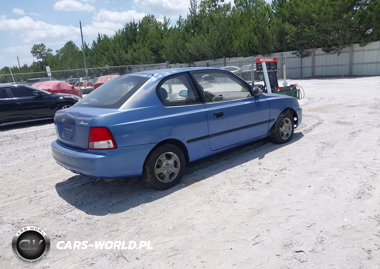 2002 Hyundai Accent L VIN:KMHCF35G82U165501 - 4