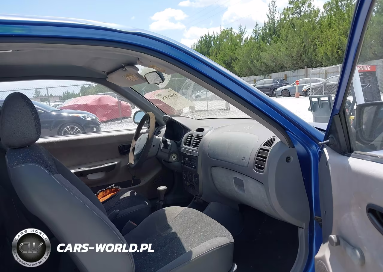 2002 Hyundai Accent L VIN:KMHCF35G82U165501 - 5