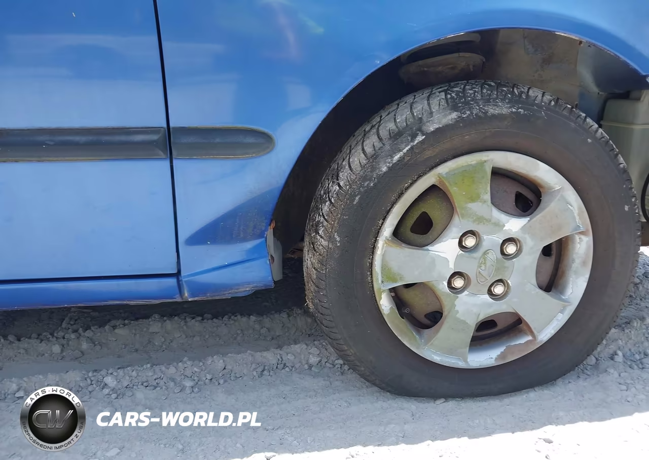 2002 Hyundai Accent L VIN:KMHCF35G82U165501 - 6