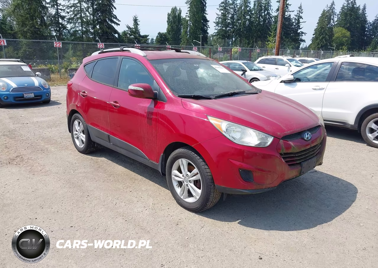 2012 Hyundai Tucson Gls VIN:KM8JUCAC6CU543705 - 1