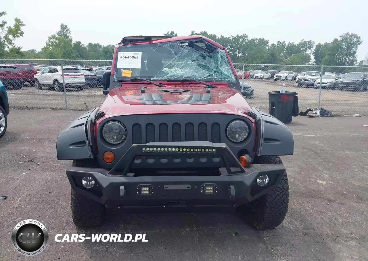 2011 Jeep Wrangler Sport VIN:1J4AA2D14BL516874 - 12