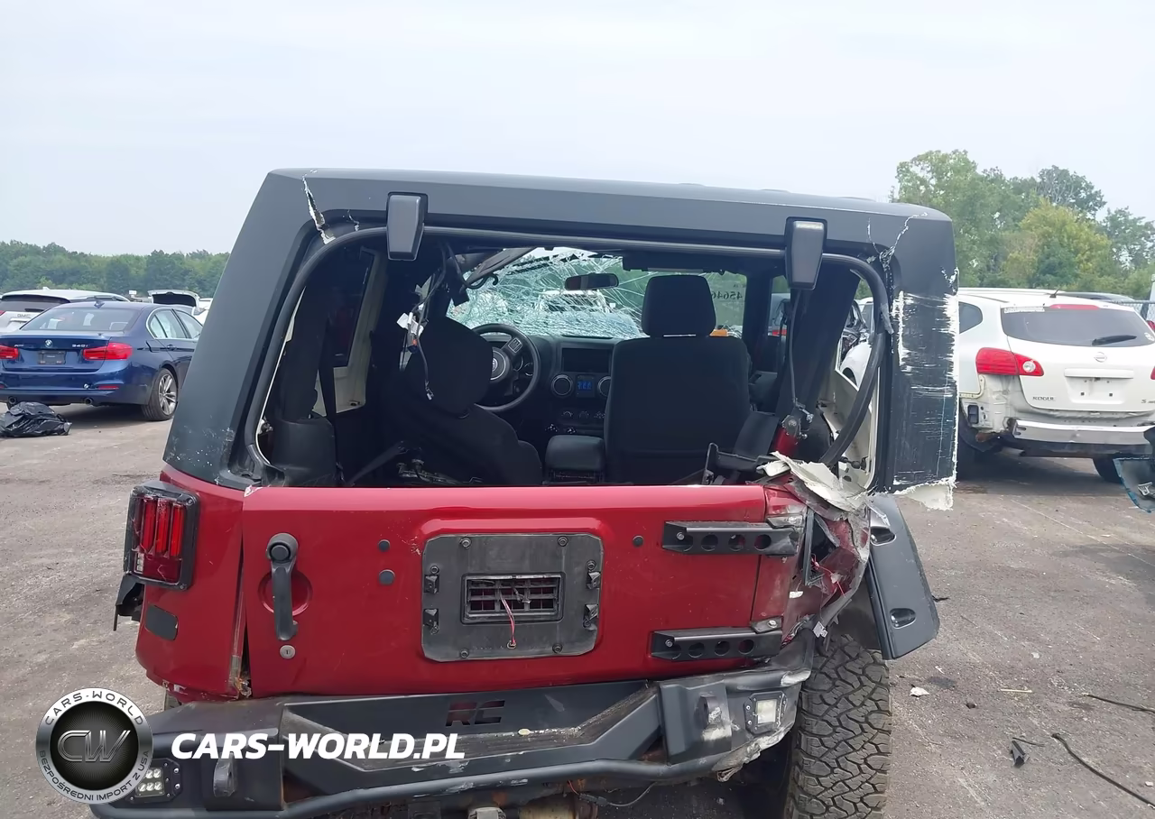 2011 Jeep Wrangler Sport VIN:1J4AA2D14BL516874 - 16