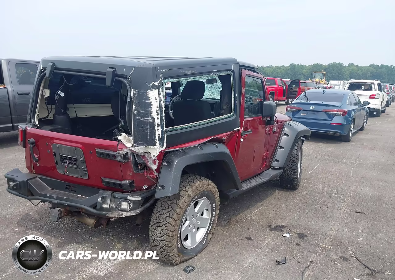 2011 Jeep Wrangler Sport VIN:1J4AA2D14BL516874 - 4