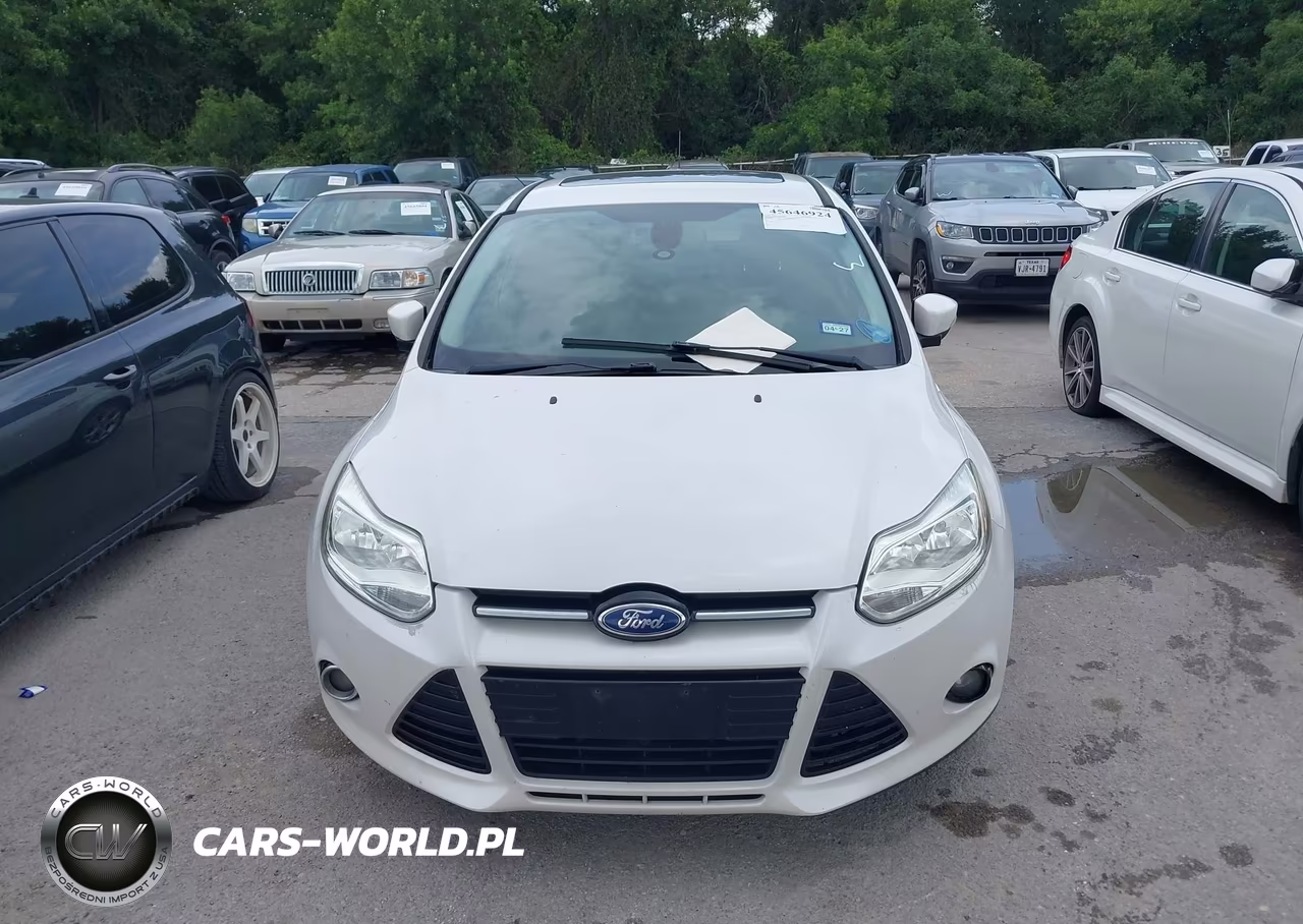 2012 Ford Focus Titanium VIN:1FAHP3N29CL256950 - 6