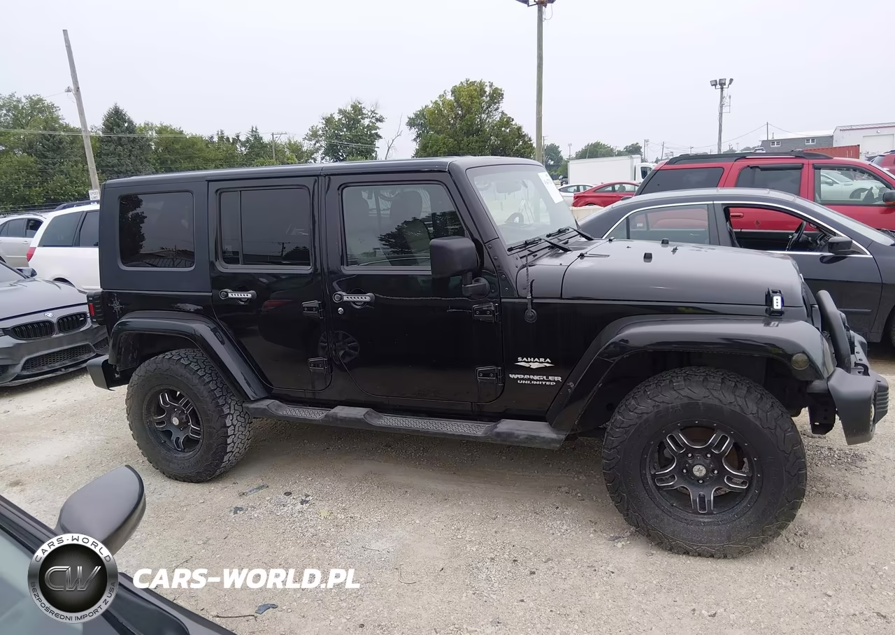 2009 Jeep Wrangler Unlimited Sahara VIN:1J4GA59199L749258 - 13