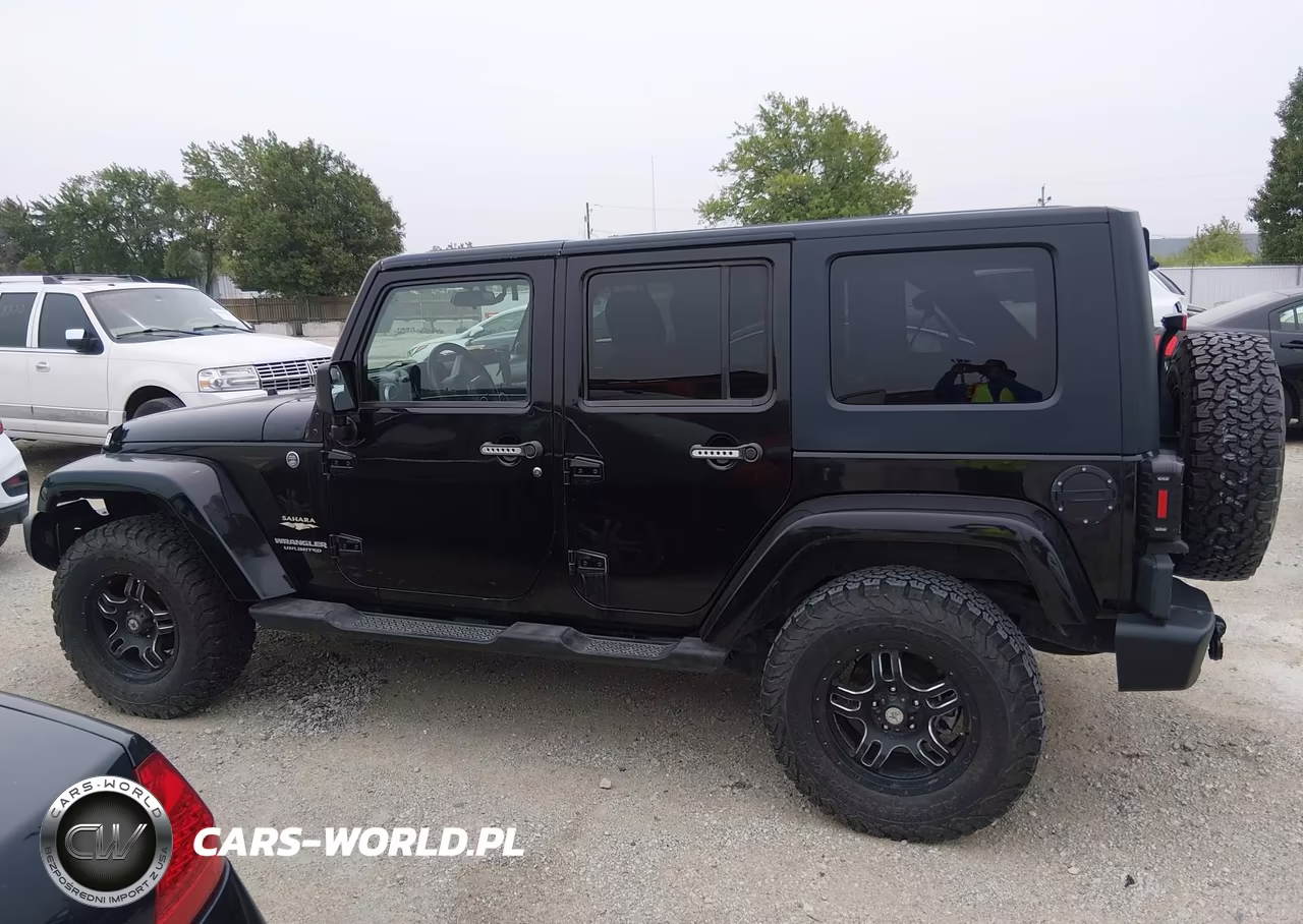 2009 Jeep Wrangler Unlimited Sahara VIN:1J4GA59199L749258 - 14