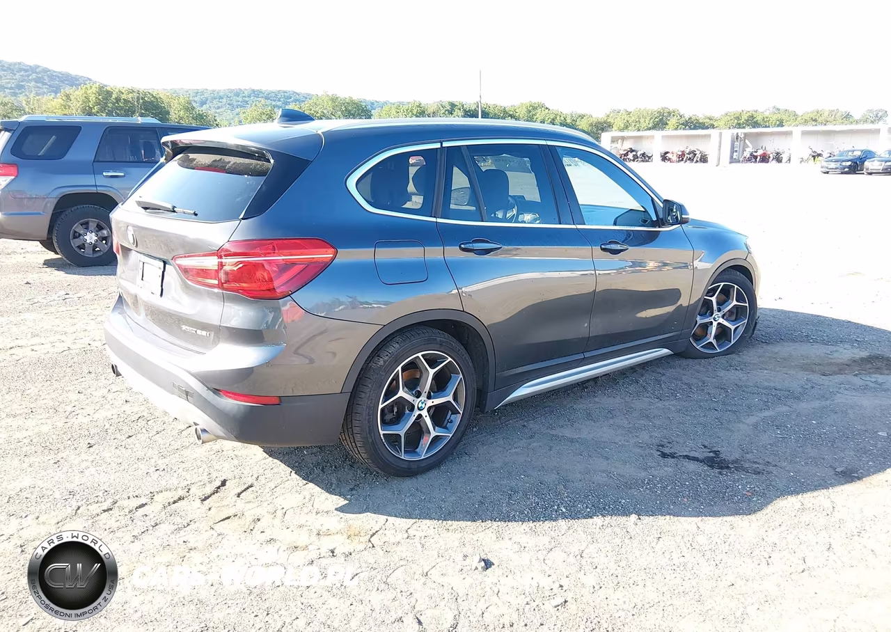 2018 BMW X1 xDrive28I VIN:WBXHT3C36J5L34705 - 4