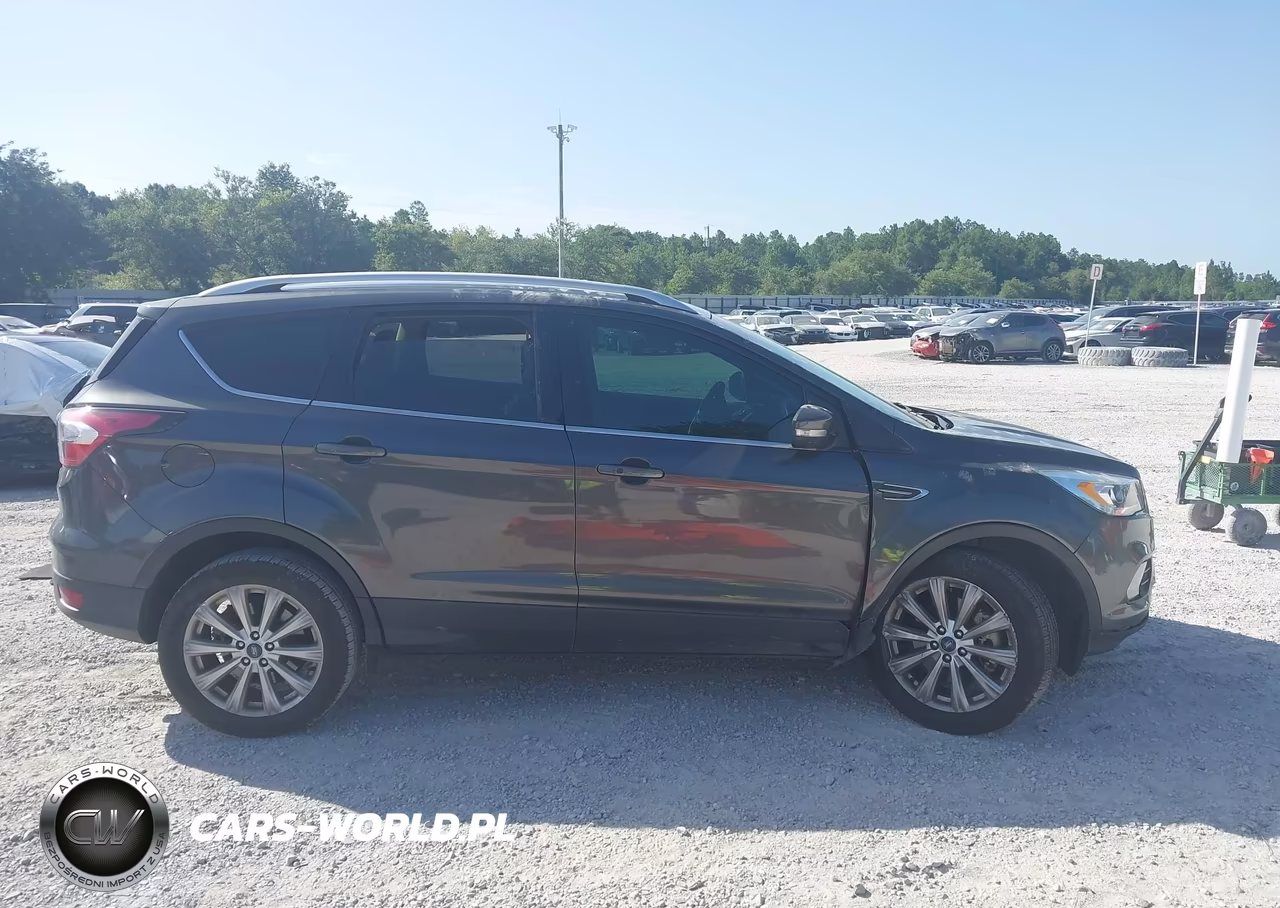 2017 Ford Escape Titanium VIN:1FMCU0J99HUB19454 - 13