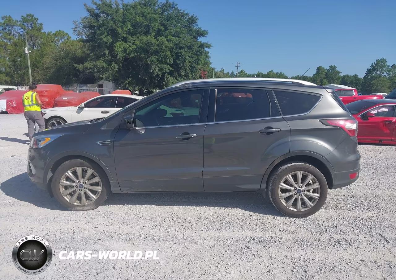 2017 Ford Escape Titanium VIN:1FMCU0J99HUB19454 - 14