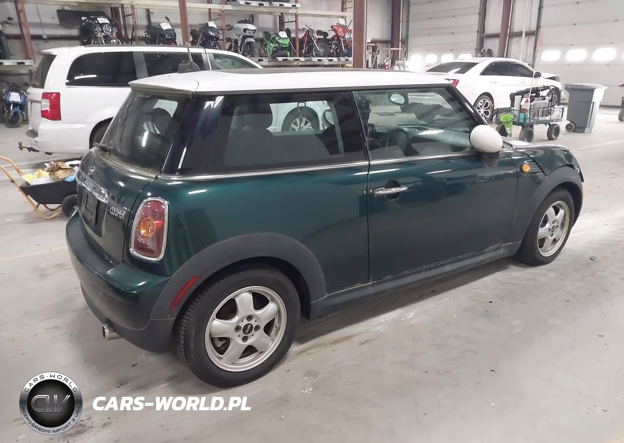 2010 Mini Cooper VIN:WMWMF3C52ATZ66551 - 4