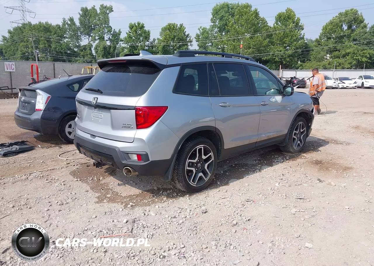 2023 Honda Passport Awd Elite VIN:5FNYF8H06PB030393 - 4