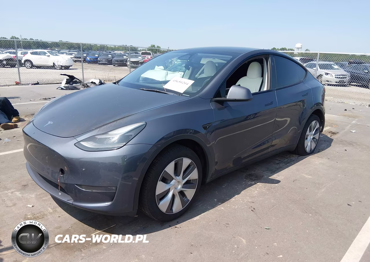 2023 Tesla Model Y Awd-Long Range Dual Motor All-Wheel Drive VIN:7SAYGDEE9PA165261 - 2