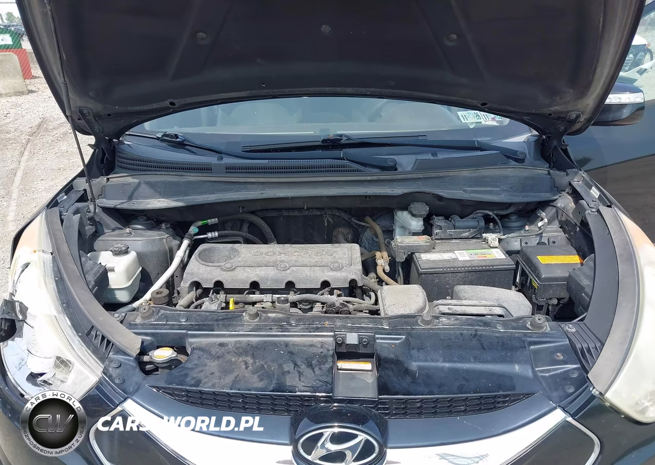 2012 Hyundai Tucson Limited VIN:KM8JUCAC5CU424544 - 10