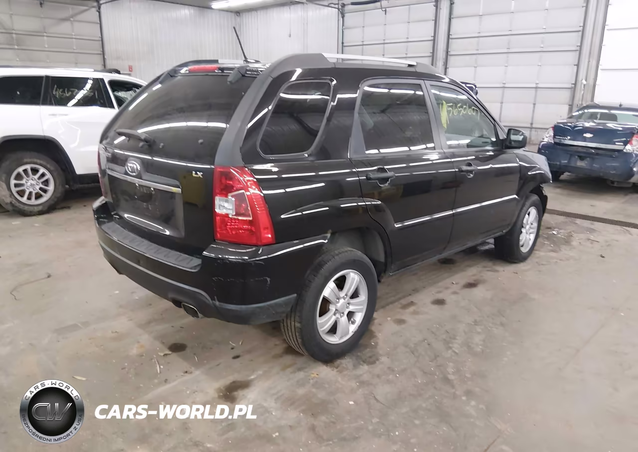 2009 Kia Sportage Lx VIN:KNDJF724697555793 - 4