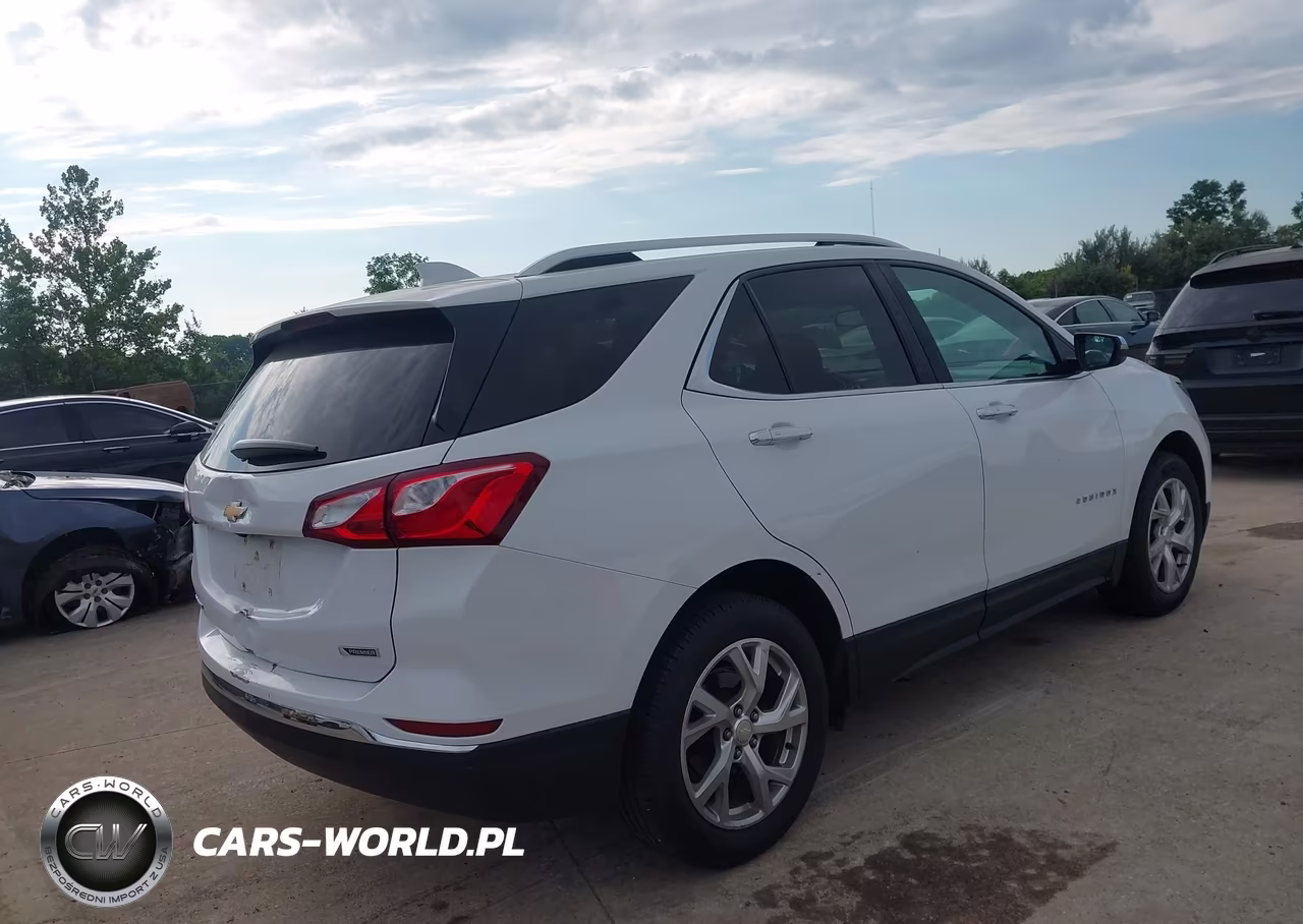 2018 Chevrolet Equinox Premier VIN:3GNAXMEV3JS600394 - 4
