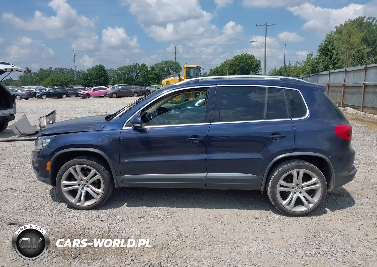 2012 Volkswagen Tiguan Sel VIN:WVGAV7AX8CW558167 - 14