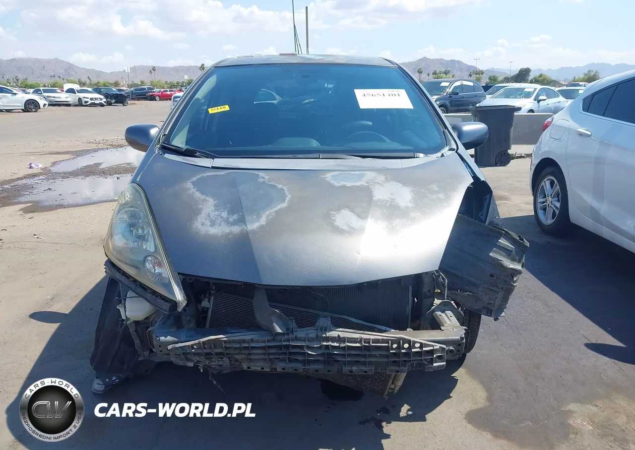 2012 Honda Fit VIN:JHMGE8H3XCC023865 - 13