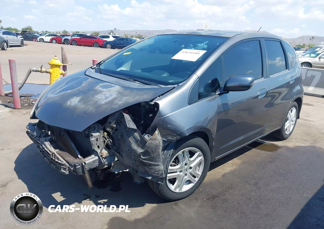 2012 Honda Fit VIN:JHMGE8H3XCC023865 - 2