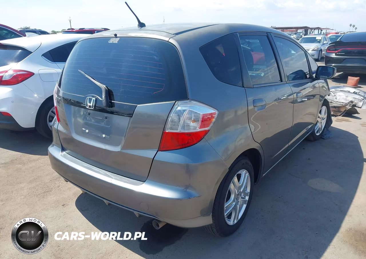2012 Honda Fit VIN:JHMGE8H3XCC023865 - 4