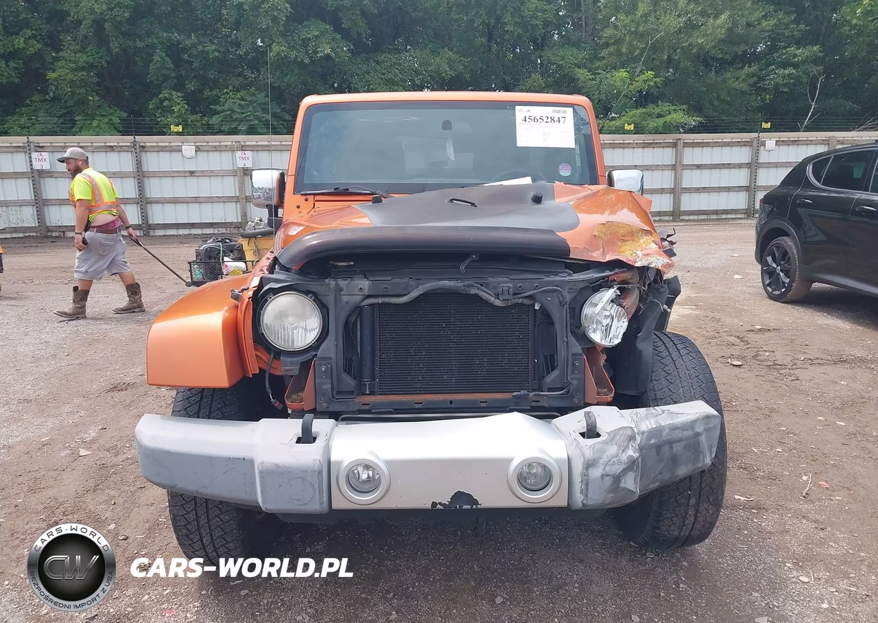 2011 Jeep Wrangler Unlimited Sahara VIN:1J4BA5H12BL528537 - 12