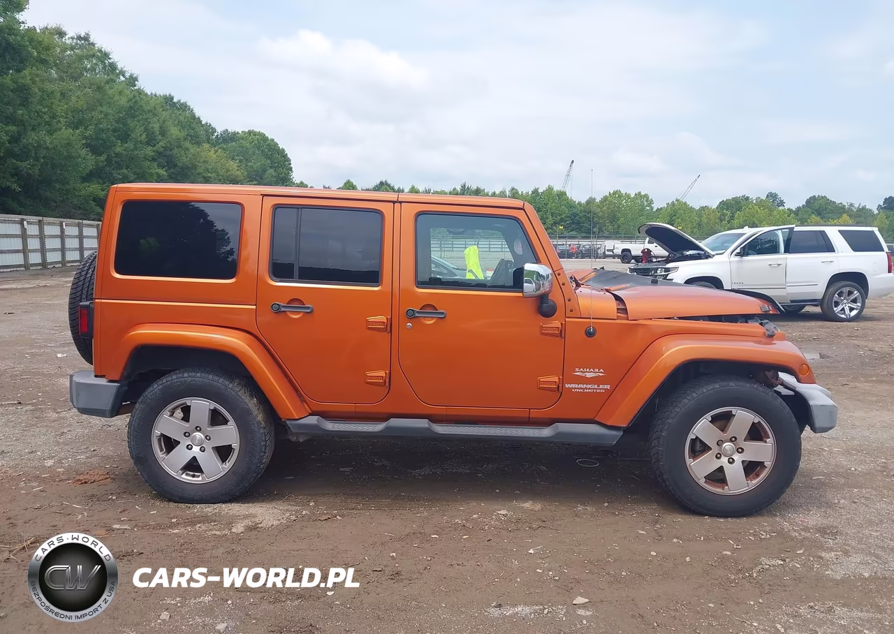 2011 Jeep Wrangler Unlimited Sahara VIN:1J4BA5H12BL528537 - 13