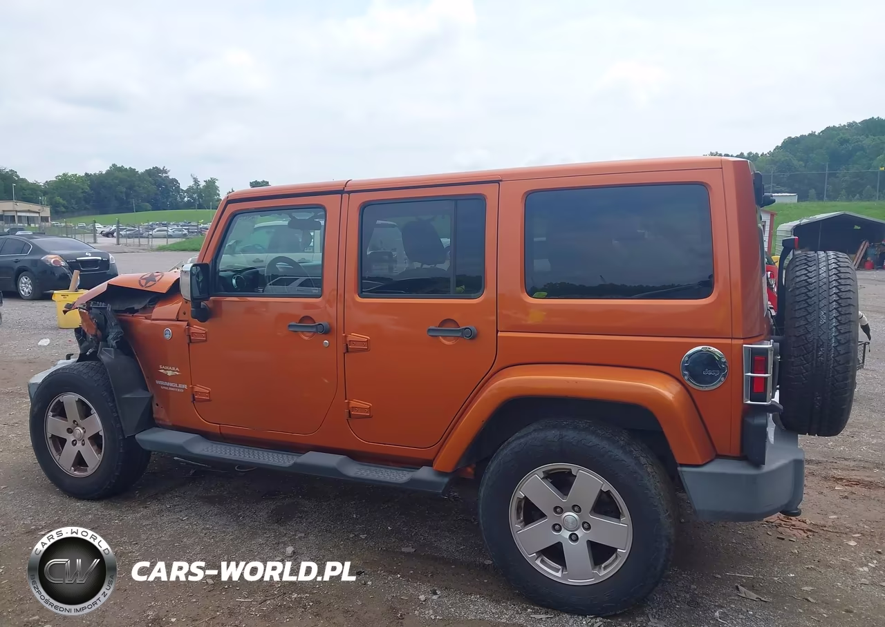 2011 Jeep Wrangler Unlimited Sahara VIN:1J4BA5H12BL528537 - 14