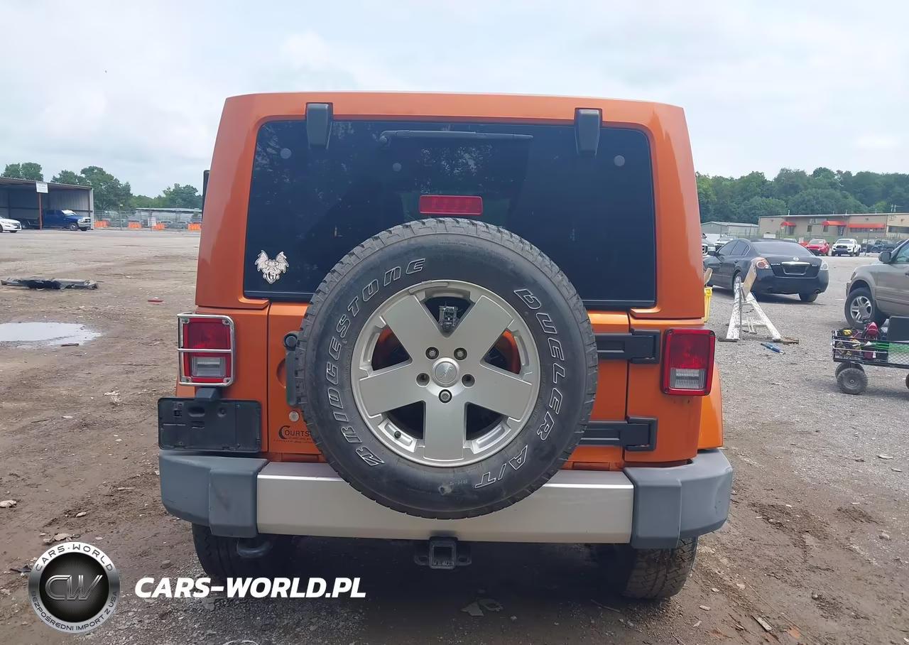 2011 Jeep Wrangler Unlimited Sahara VIN:1J4BA5H12BL528537 - 16