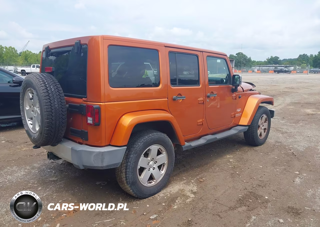2011 Jeep Wrangler Unlimited Sahara VIN:1J4BA5H12BL528537 - 4