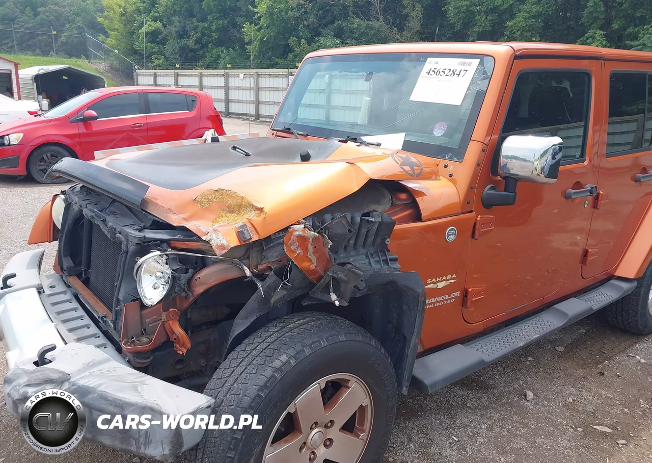 2011 Jeep Wrangler Unlimited Sahara VIN:1J4BA5H12BL528537 - 6