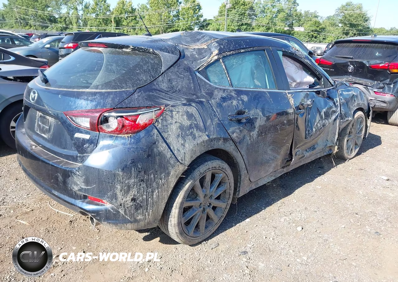 2018 Mazda Mazda3 Touring VIN:3MZBN1L39JM198885 - 4