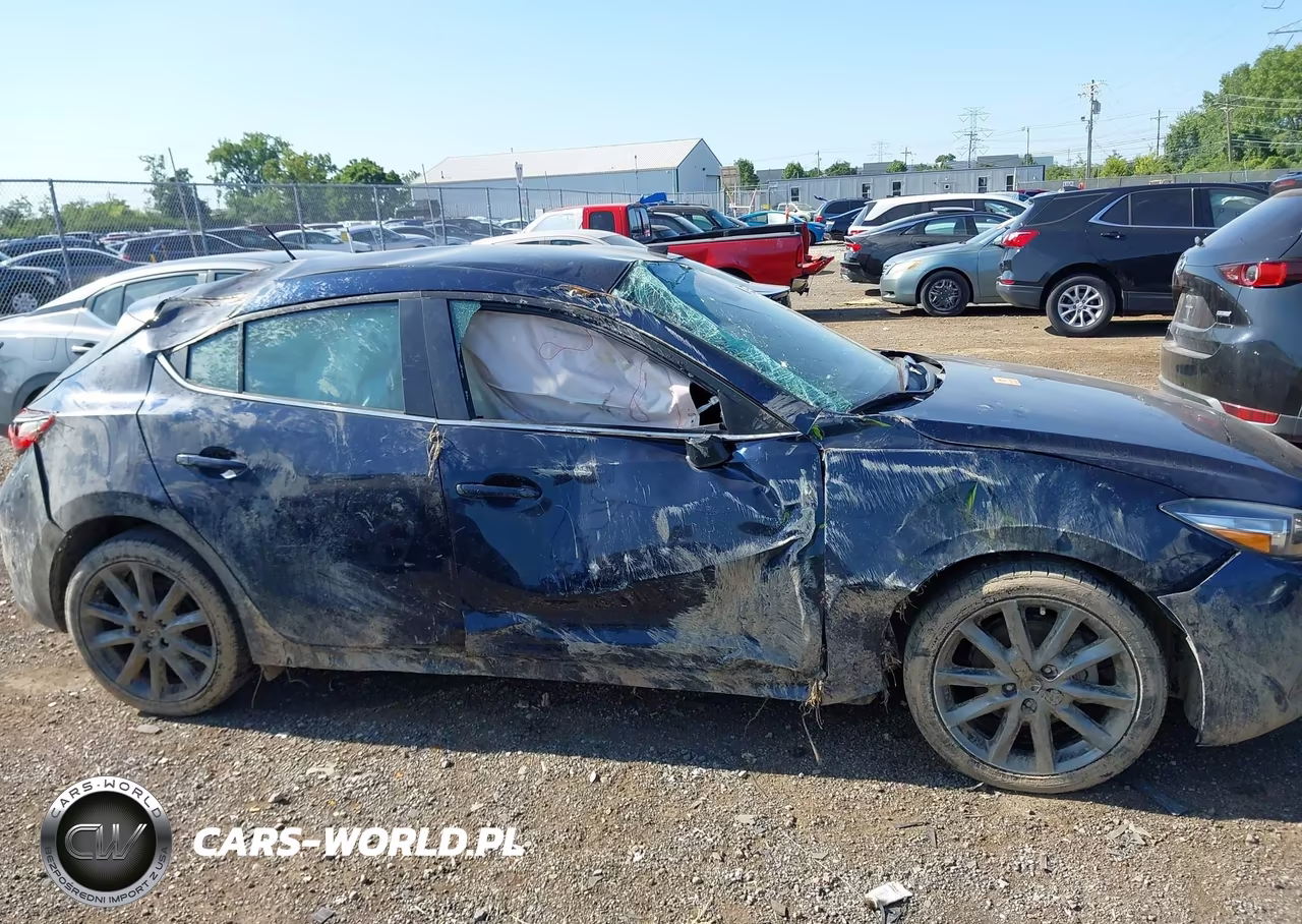 2018 Mazda Mazda3 Touring VIN:3MZBN1L39JM198885 - 5