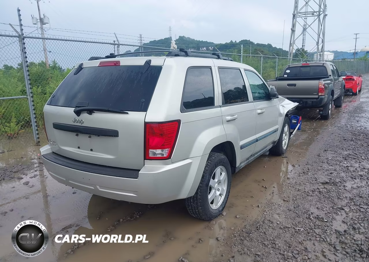 2009 Jeep Grand Cherokee Laredo VIN:1J8GR48K89C506701 - 4