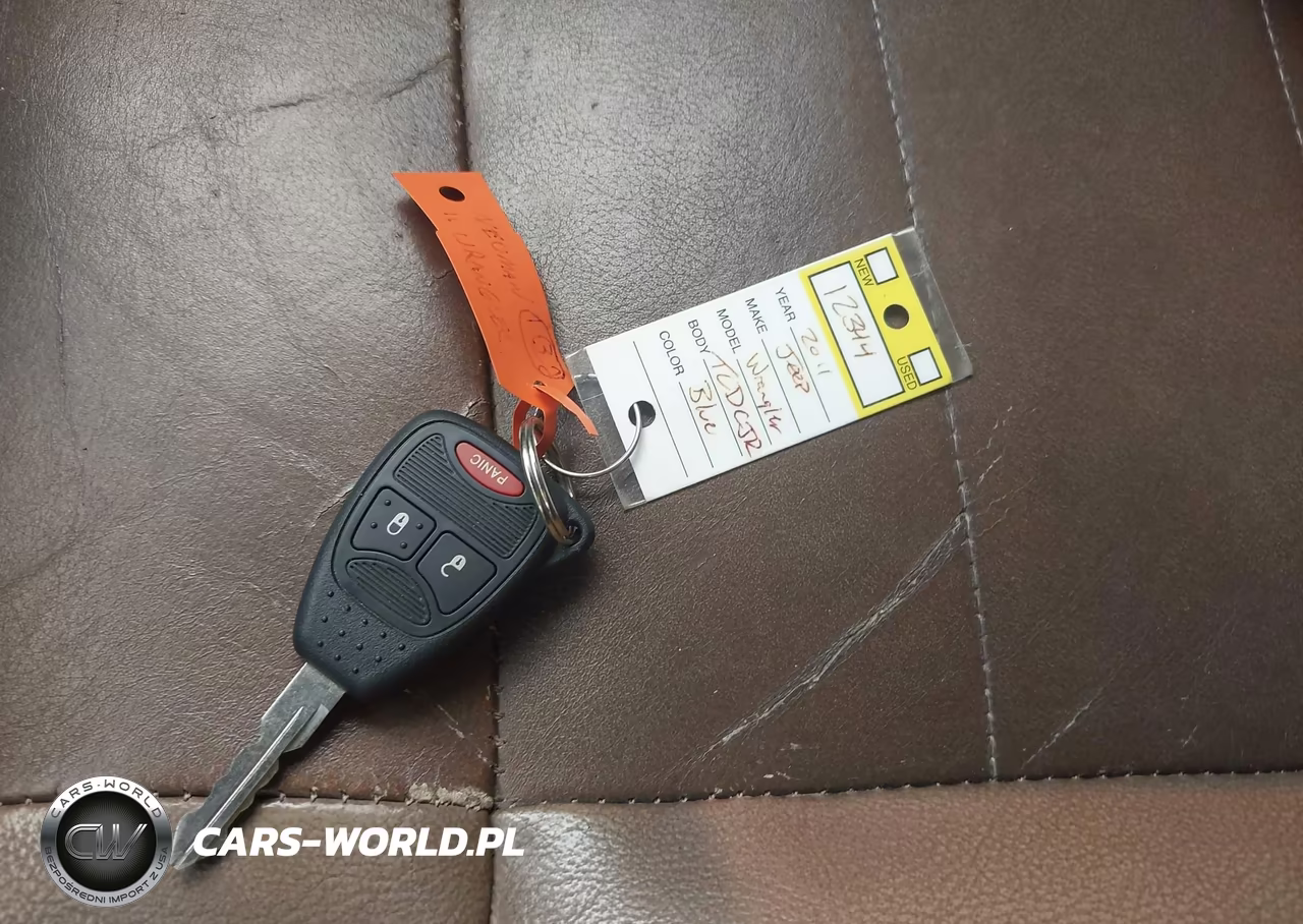 2011 Jeep Wrangler Unlimited Sahara VIN:1J4BA5H11BL563361 - 11