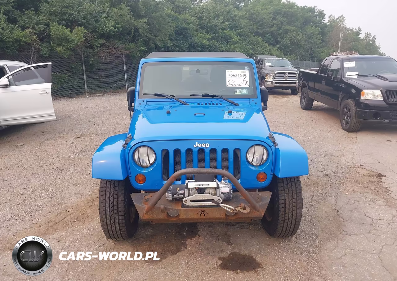 2011 Jeep Wrangler Unlimited Sahara VIN:1J4BA5H11BL563361 - 12
