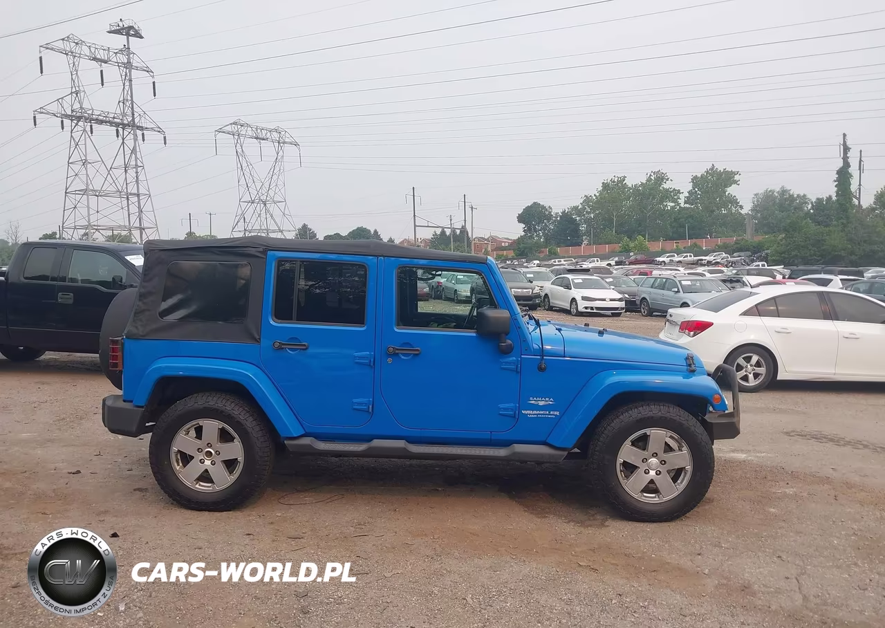 2011 Jeep Wrangler Unlimited Sahara VIN:1J4BA5H11BL563361 - 13
