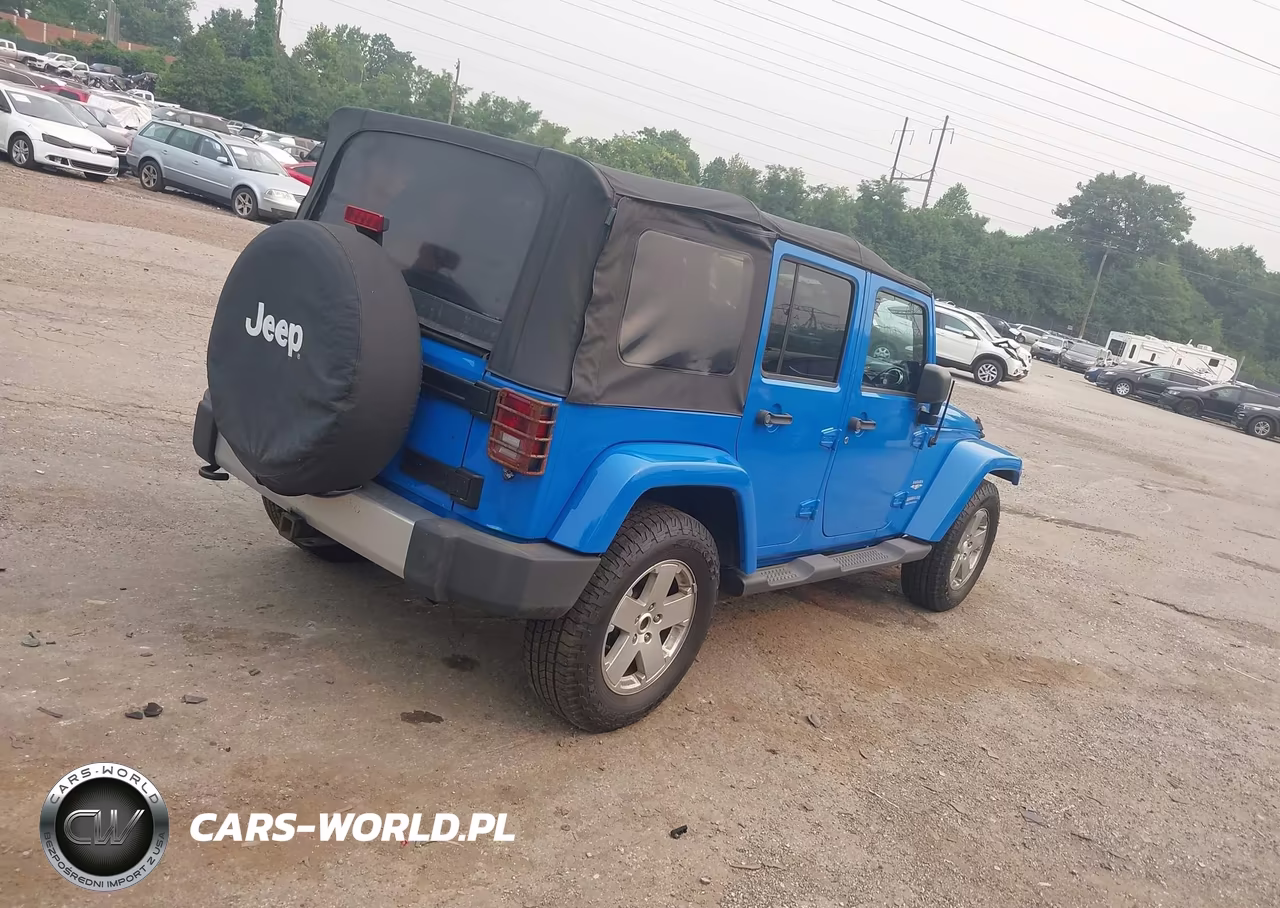 2011 Jeep Wrangler Unlimited Sahara VIN:1J4BA5H11BL563361 - 4