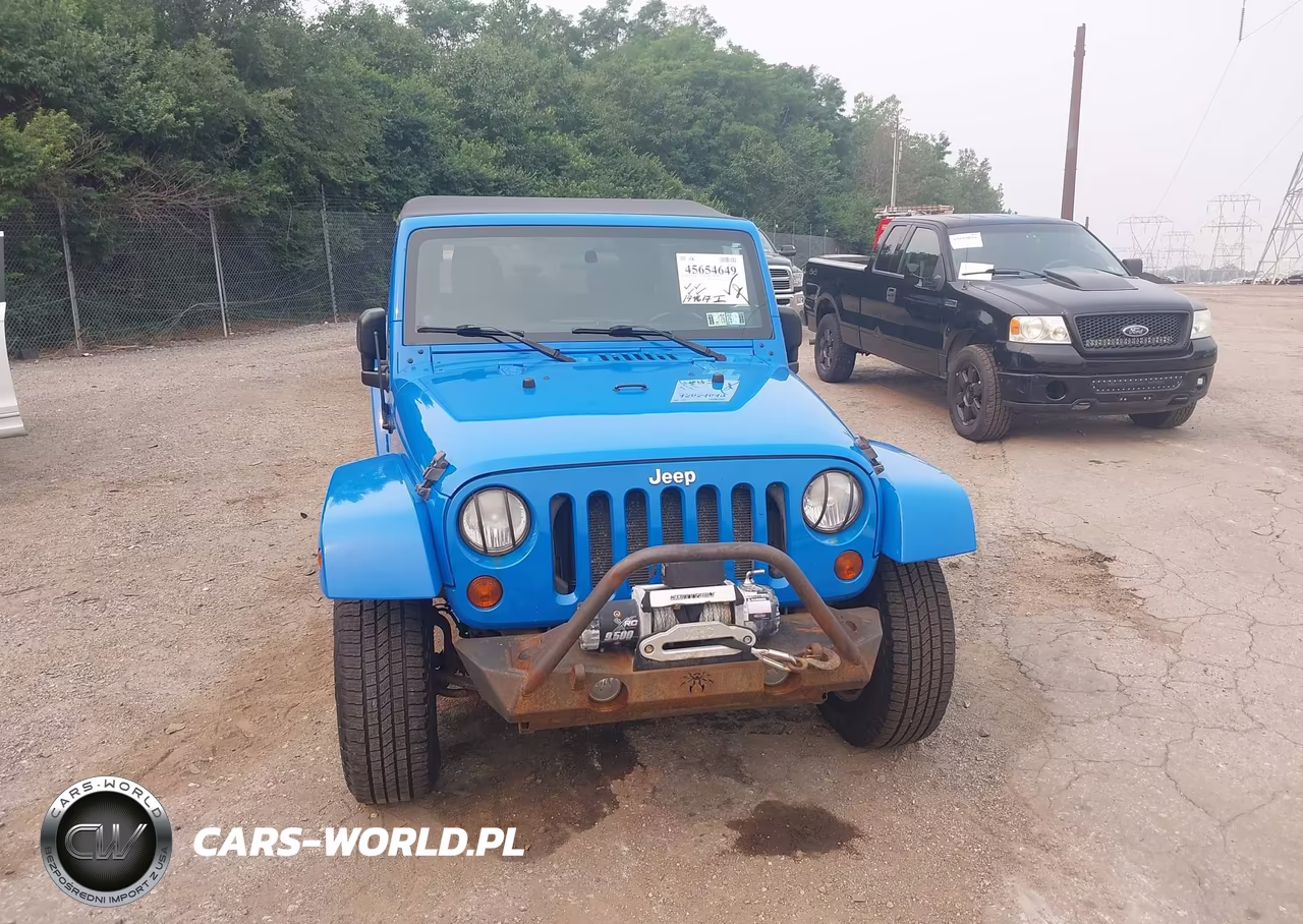 2011 Jeep Wrangler Unlimited Sahara VIN:1J4BA5H11BL563361 - 6