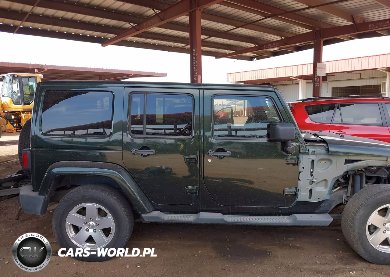 2011 Jeep Wrangler Unlimited Sahara VIN:1J4HA5H1XBL543877 - 14