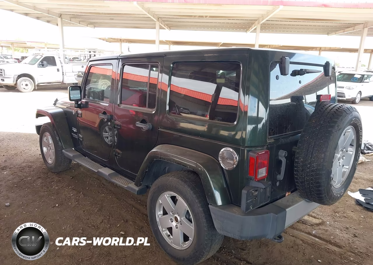 2011 Jeep Wrangler Unlimited Sahara VIN:1J4HA5H1XBL543877 - 3