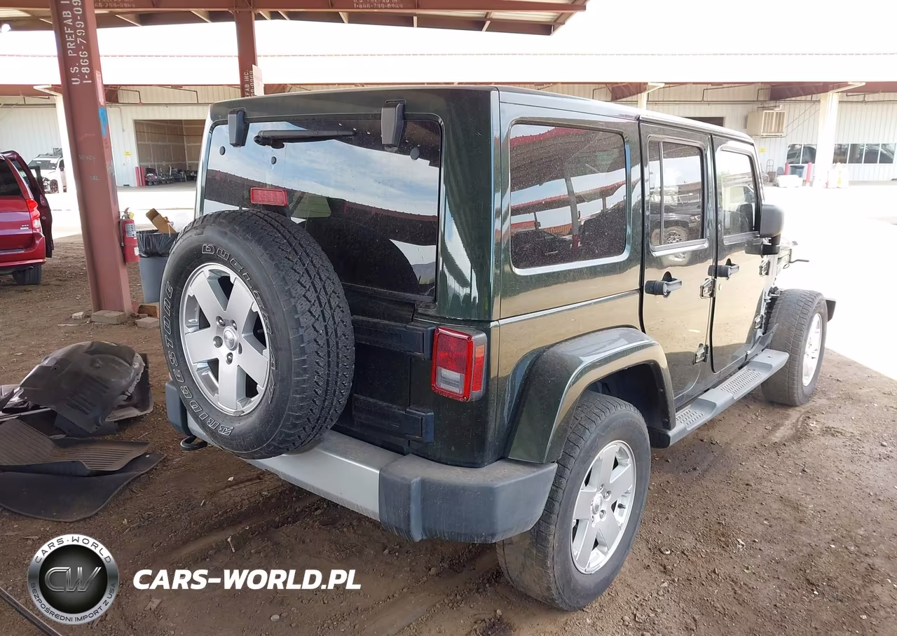 2011 Jeep Wrangler Unlimited Sahara VIN:1J4HA5H1XBL543877 - 4