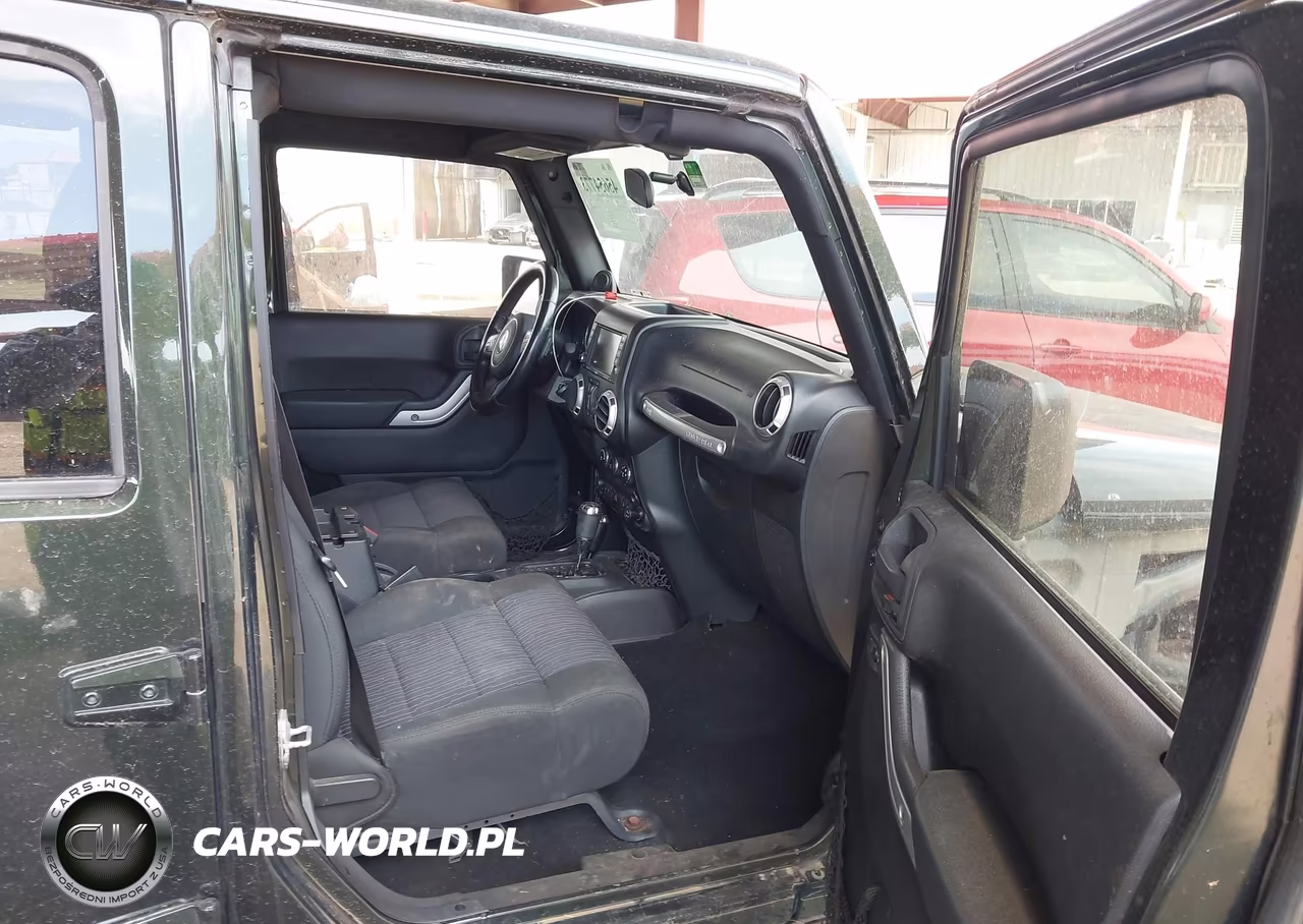 2011 Jeep Wrangler Unlimited Sahara VIN:1J4HA5H1XBL543877 - 5
