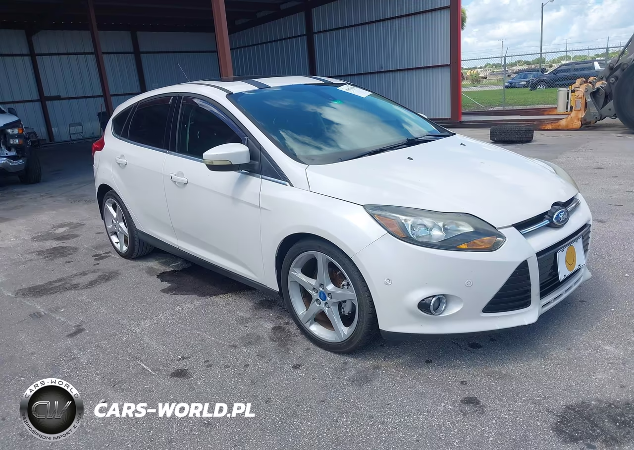 2012 Ford Focus Titanium VIN:1FAHP3N24CL125957 - 1