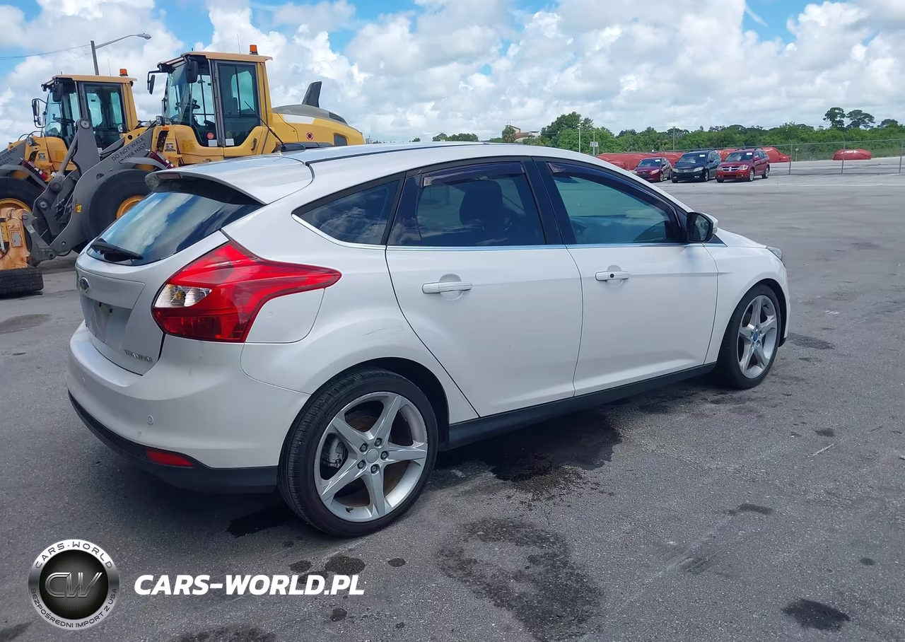2012 Ford Focus Titanium VIN:1FAHP3N24CL125957 - 4