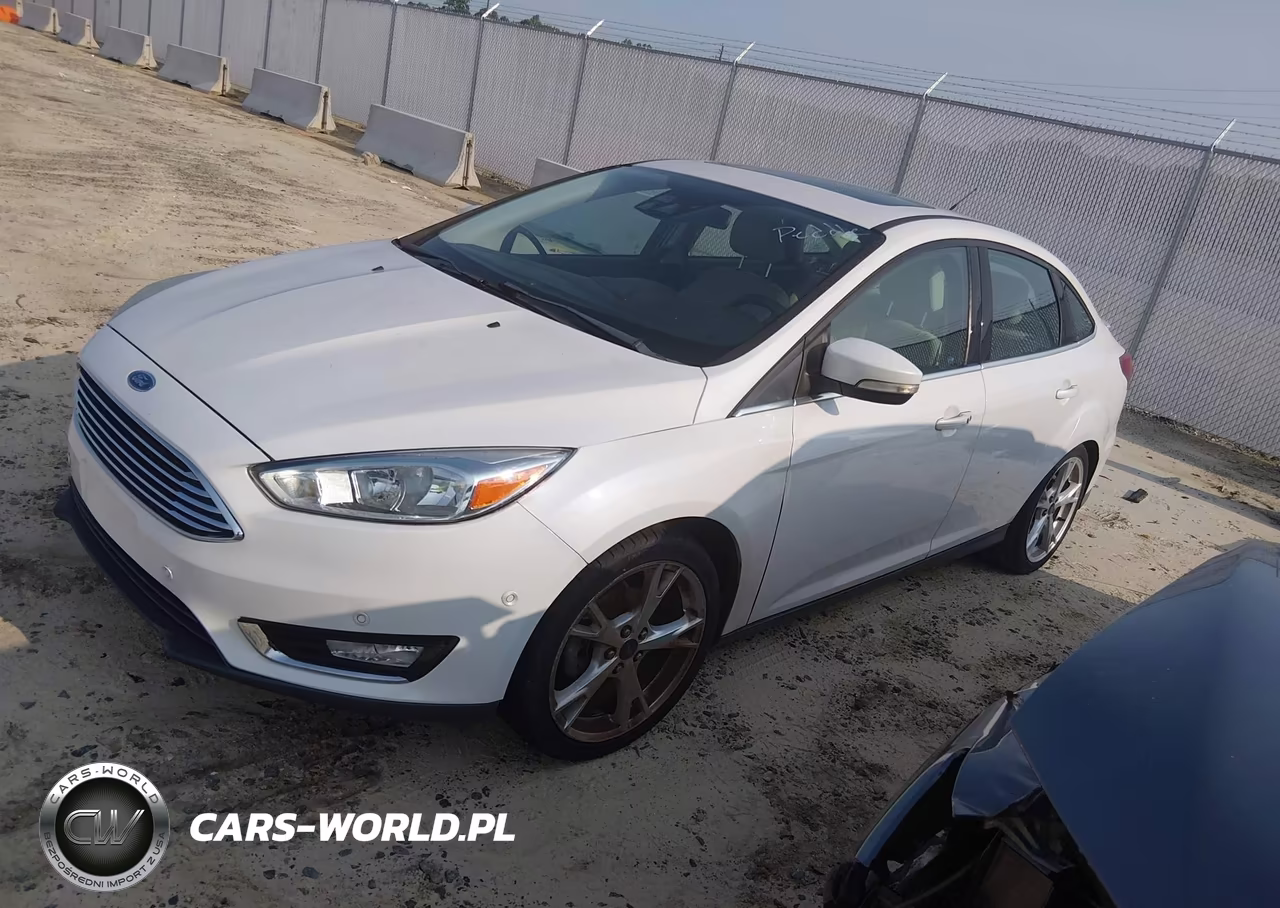 2015 Ford Focus Titanium VIN:1FADP3J24FL209334 - 2