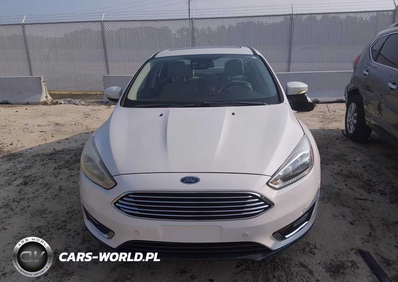 2015 Ford Focus Titanium VIN:1FADP3J24FL209334 - 6