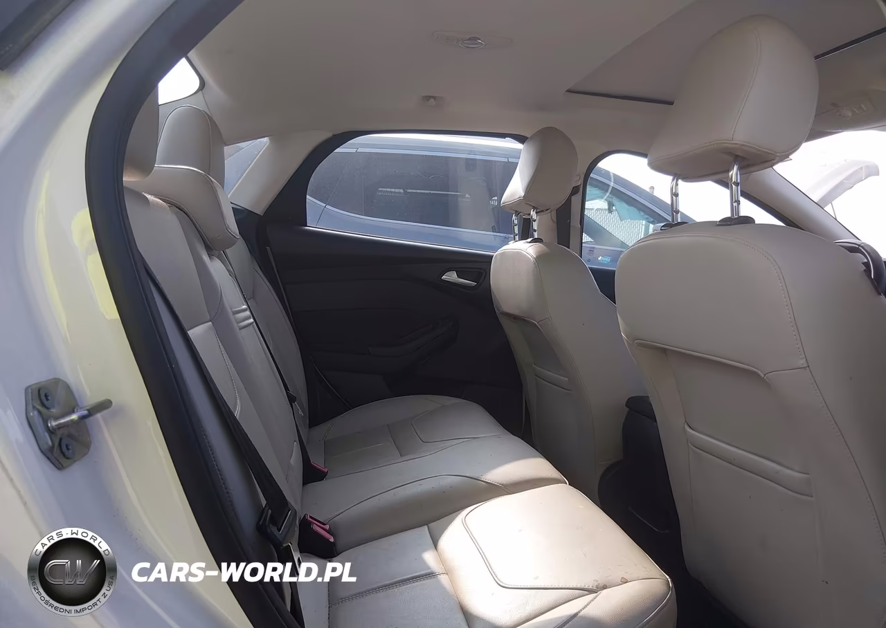 2015 Ford Focus Titanium VIN:1FADP3J24FL209334 - 8