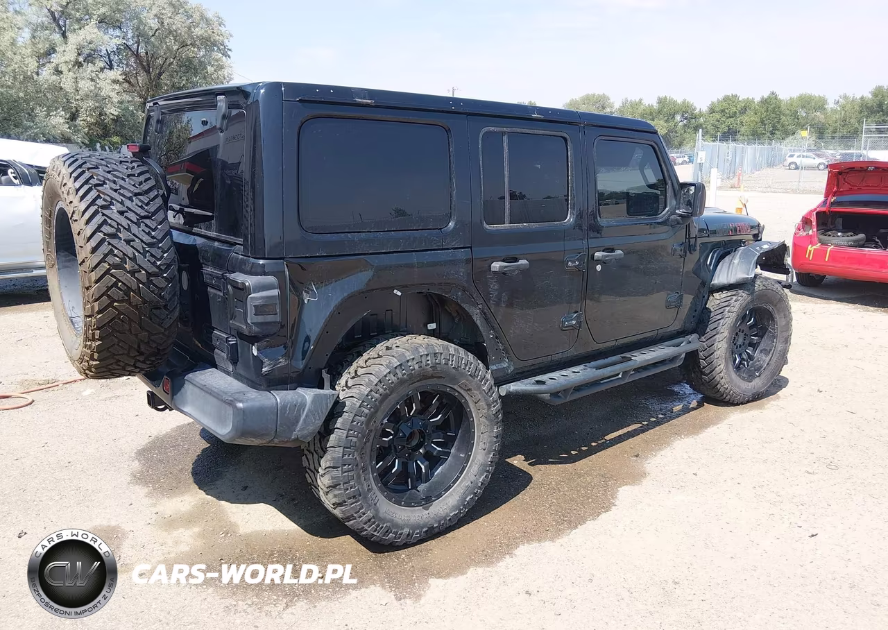 2019 Jeep Wrangler Unlimited Sahara VIN:1C4HJXEG5KW565066 - 4