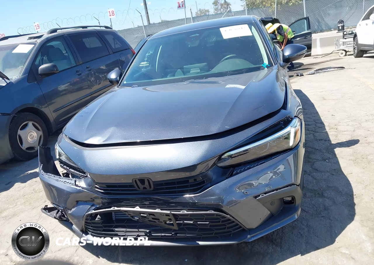 2023 Honda Civic Touring VIN:2HGFE1F97PH322746 - 12