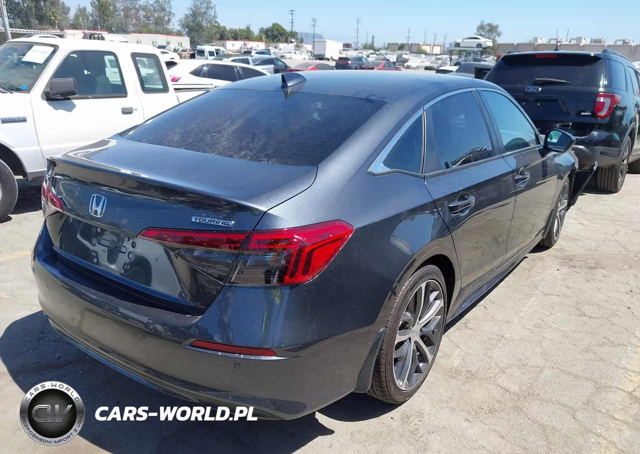 2023 Honda Civic Touring VIN:2HGFE1F97PH322746 - 4