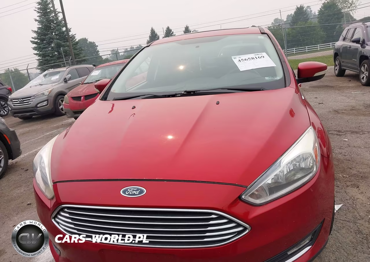 2018 Ford Focus Titanium VIN:1FADP3J27JL294209 - 12